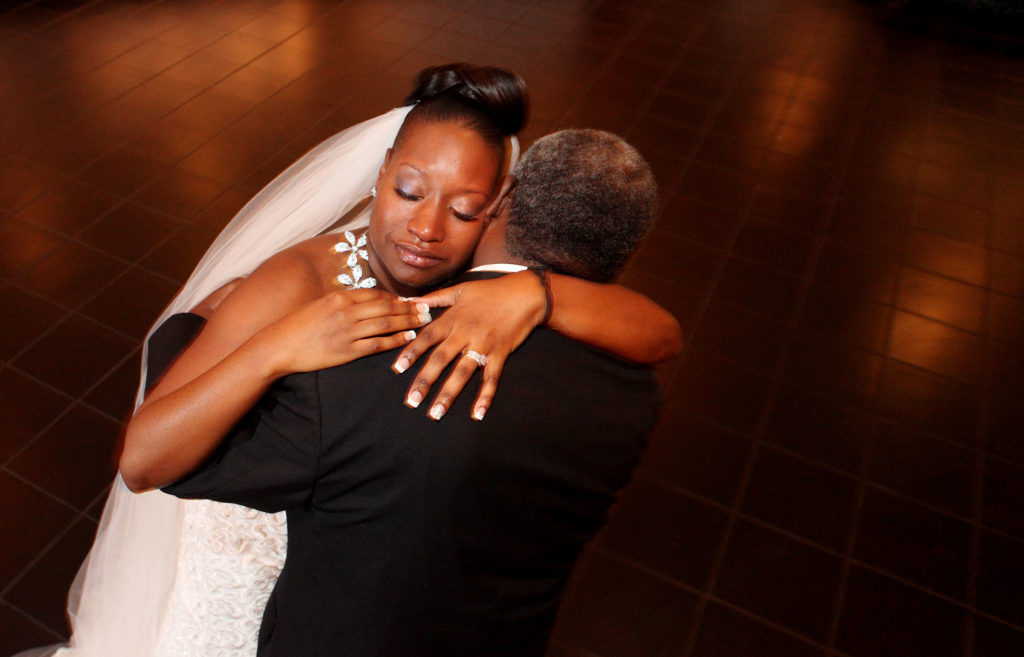 Father daughter dance during a wedding reception in Norfolk, Virginia.